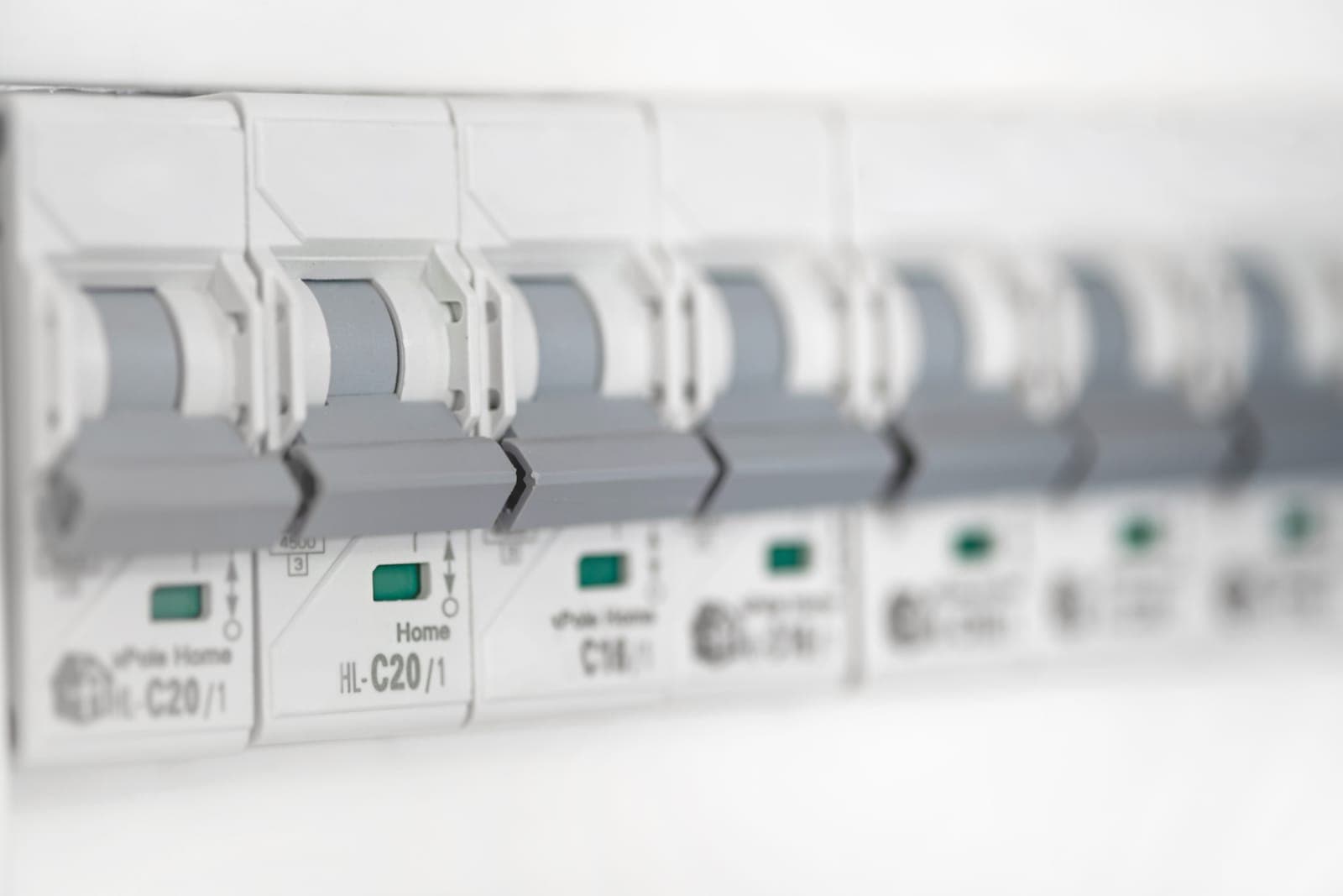 A close-up of circuit breaker switches in an electrical panel