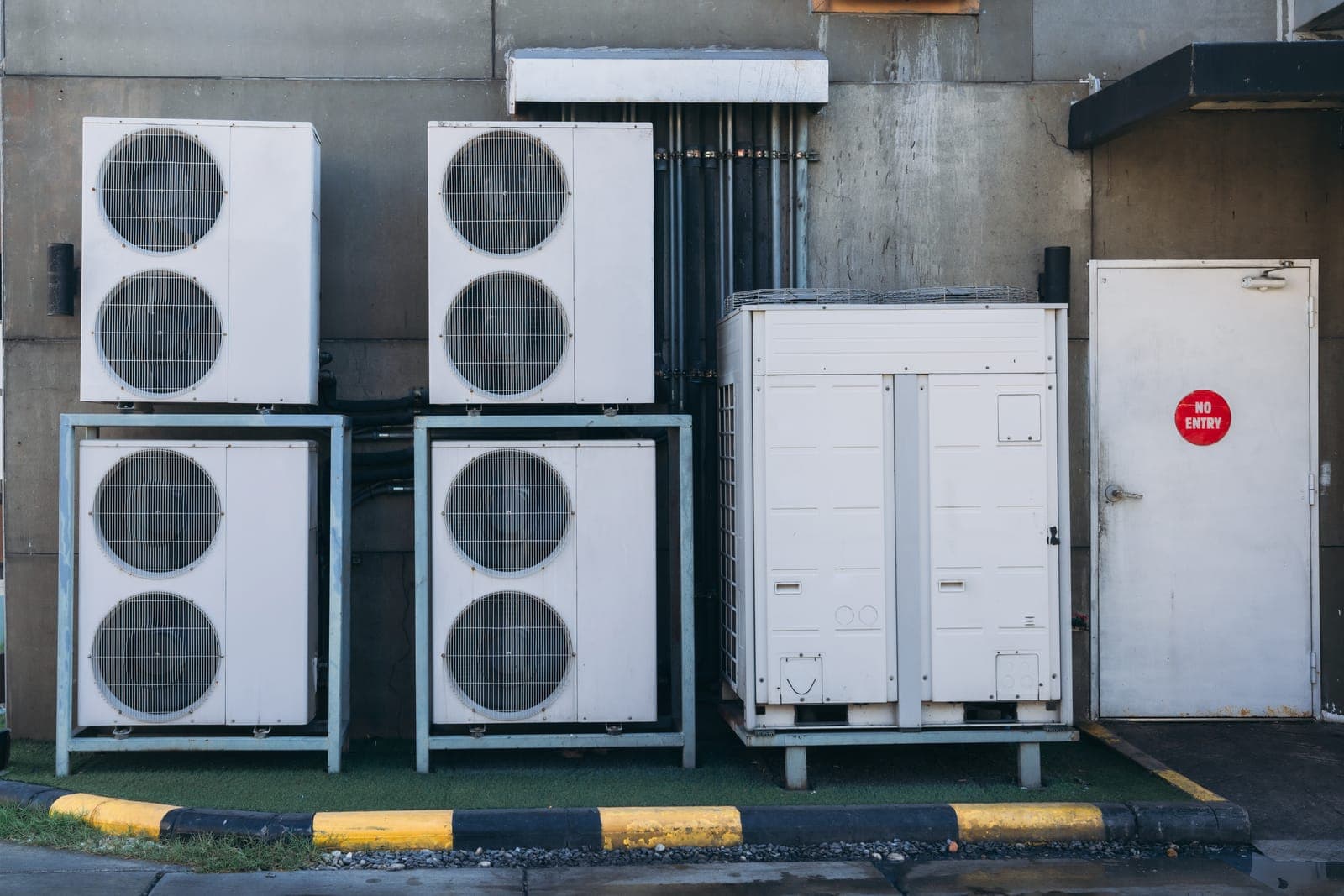 An array of new air conditioning units lined up