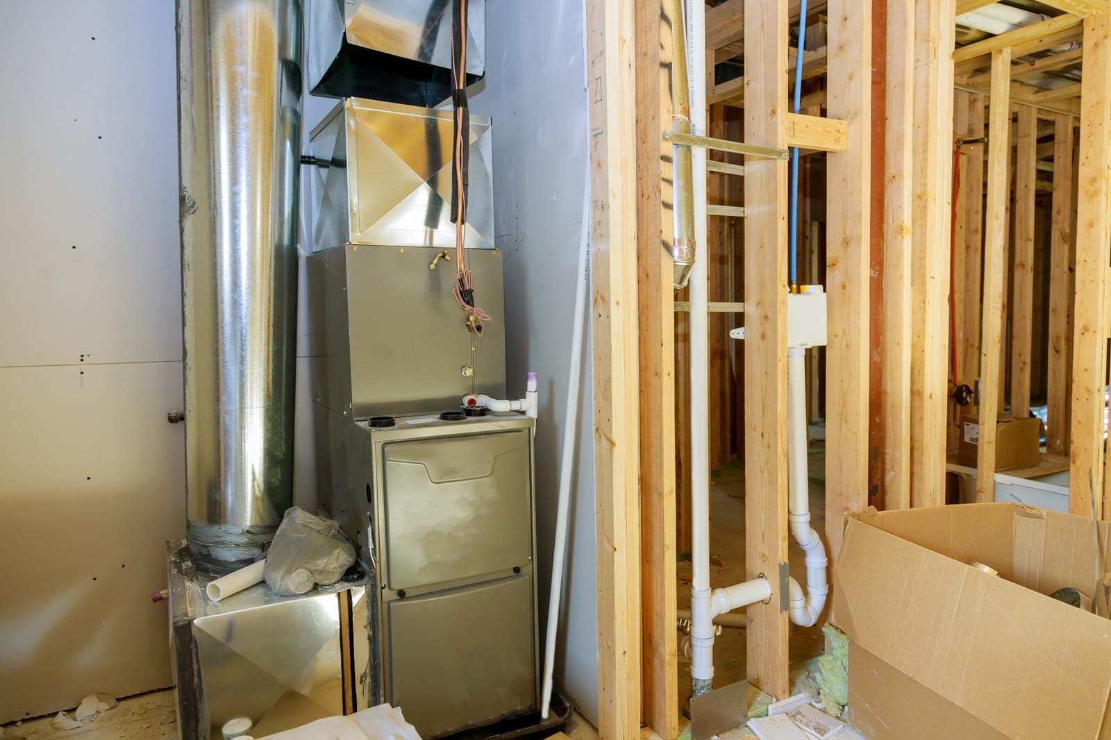 A residential furnace and ductwork in a home