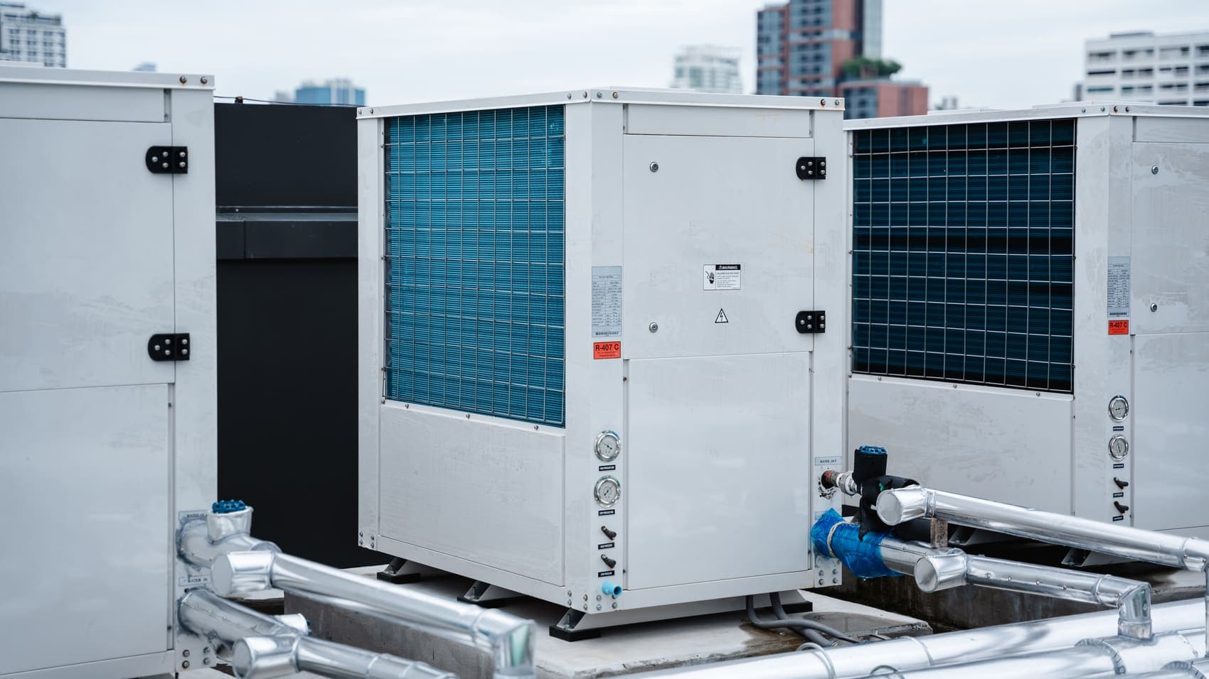 Industrial rooftop HVAC units on a commercial building