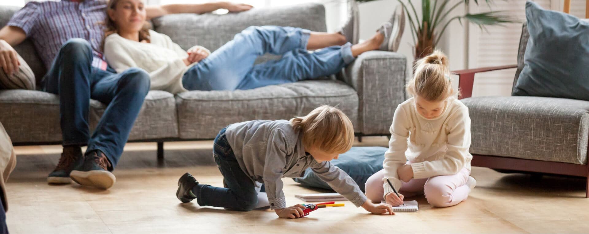 A family relaxing comfortably in a cool home